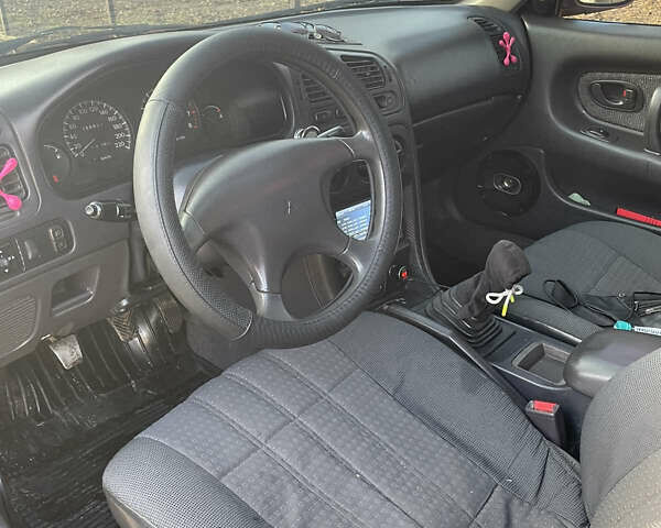 Красный Мицубиси Галант, объемом двигателя 1.8 л и пробегом 300 тыс. км за 2500 $, фото 5 на Automoto.ua