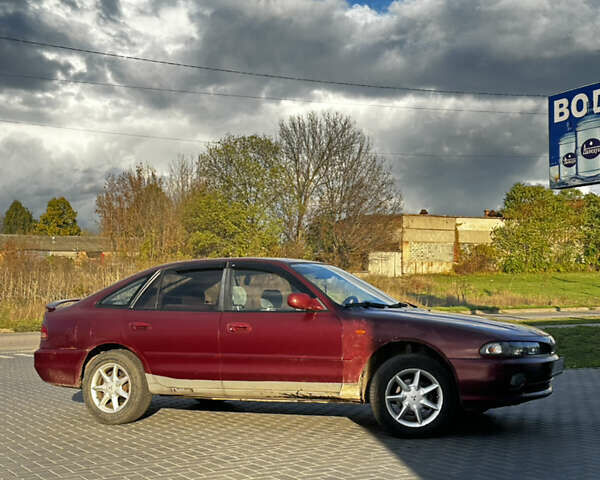 Красный Мицубиси Галант, объемом двигателя 2 л и пробегом 370 тыс. км за 2500 $, фото 1 на Automoto.ua