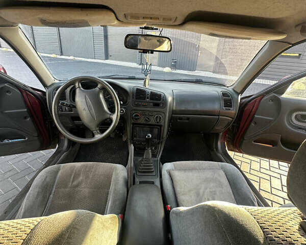 Красный Мицубиси Галант, объемом двигателя 2 л и пробегом 370 тыс. км за 2500 $, фото 13 на Automoto.ua