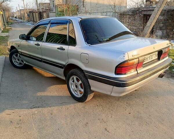 Сірий Міцубісі Галант, об'ємом двигуна 1.8 л та пробігом 364 тис. км за 1500 $, фото 1 на Automoto.ua