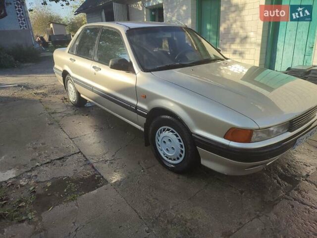 Сірий Міцубісі Галант, об'ємом двигуна 1.8 л та пробігом 400 тис. км за 1900 $, фото 3 на Automoto.ua