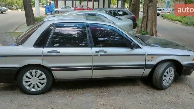 Серый Мицубиси Галант, объемом двигателя 2 л и пробегом 320 тыс. км за 1500 $, фото 2 на Automoto.ua