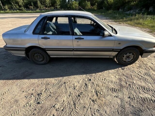 Серый Мицубиси Галант, объемом двигателя 1.8 л и пробегом 280 тыс. км за 675 $, фото 1 на Automoto.ua