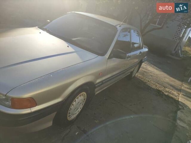 Сірий Міцубісі Галант, об'ємом двигуна 1.8 л та пробігом 400 тис. км за 1900 $, фото 2 на Automoto.ua