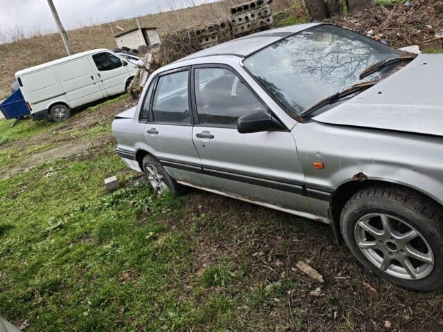 Серый Мицубиси Галант, объемом двигателя 1.8 л и пробегом 300 тыс. км за 450 $, фото 3 на Automoto.ua