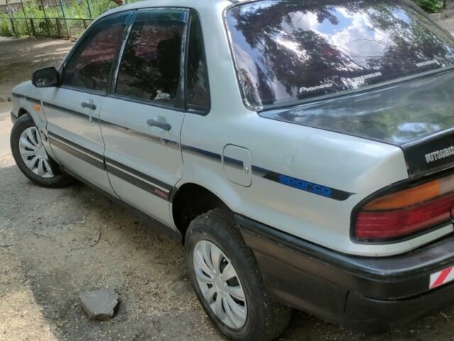 Сірий Міцубісі Галант, об'ємом двигуна 2 л та пробігом 320 тис. км за 1500 $, фото 1 на Automoto.ua