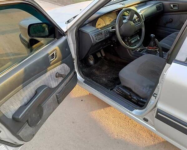 Сірий Міцубісі Галант, об'ємом двигуна 1.8 л та пробігом 364 тис. км за 1500 $, фото 6 на Automoto.ua