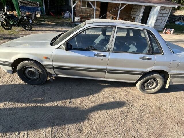 Серый Мицубиси Галант, объемом двигателя 1.8 л и пробегом 280 тыс. км за 675 $, фото 2 на Automoto.ua