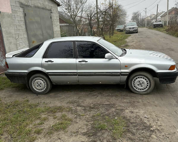 Серый Мицубиси Галант, объемом двигателя 2 л и пробегом 290 тыс. км за 1800 $, фото 2 на Automoto.ua