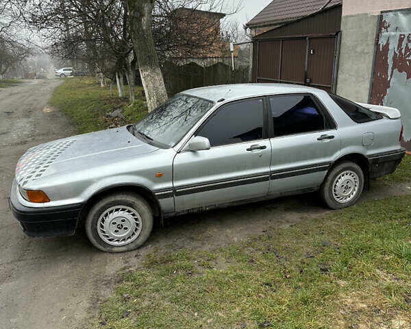 Серый Мицубиси Галант, объемом двигателя 2 л и пробегом 290 тыс. км за 1800 $, фото 1 на Automoto.ua