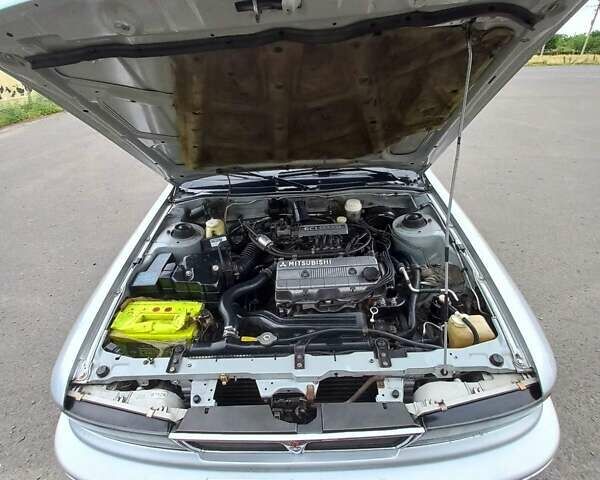 Серый Мицубиси Галант, объемом двигателя 2 л и пробегом 320 тыс. км за 2500 $, фото 2 на Automoto.ua