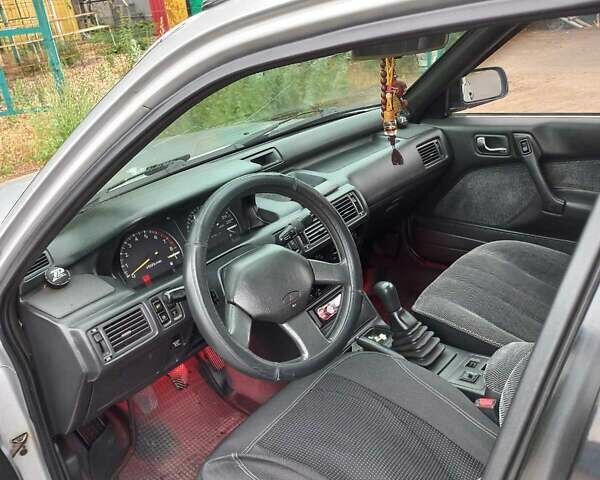 Серый Мицубиси Галант, объемом двигателя 2 л и пробегом 320 тыс. км за 2500 $, фото 1 на Automoto.ua