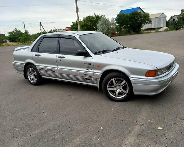 Серый Мицубиси Галант, объемом двигателя 2 л и пробегом 320 тыс. км за 2500 $, фото 4 на Automoto.ua