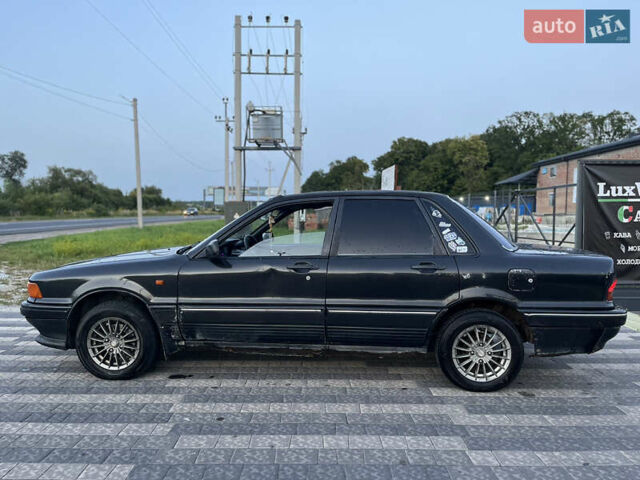 Сірий Міцубісі Галант, об'ємом двигуна 1.76 л та пробігом 380 тис. км за 1500 $, фото 5 на Automoto.ua