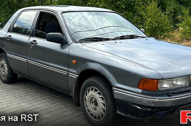 Сірий Міцубісі Галант, об'ємом двигуна 2 л та пробігом 250 тис. км за 950 $, фото 1 на Automoto.ua