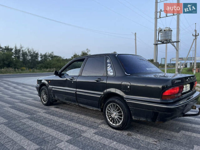 Сірий Міцубісі Галант, об'ємом двигуна 1.76 л та пробігом 380 тис. км за 1500 $, фото 4 на Automoto.ua