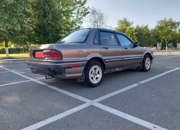 Сірий Міцубісі Галант, об'ємом двигуна 1.8 л та пробігом 370 тис. км за 1500 $, фото 1 на Automoto.ua