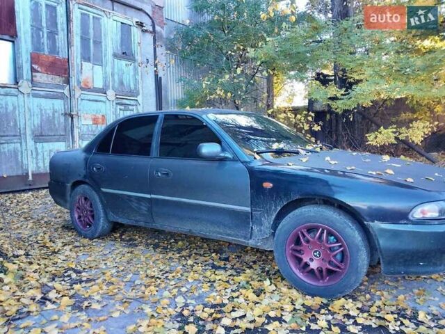 Серый Мицубиси Галант, объемом двигателя 1.8 л и пробегом 245 тыс. км за 2000 $, фото 3 на Automoto.ua