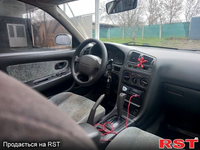 Сірий Міцубісі Галант, об'ємом двигуна 18 л та пробігом 300 тис. км за 1800 $, фото 9 на Automoto.ua