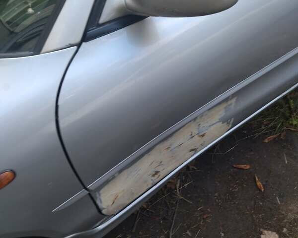 Серый Мицубиси Галант, объемом двигателя 2 л и пробегом 318 тыс. км за 1500 $, фото 1 на Automoto.ua