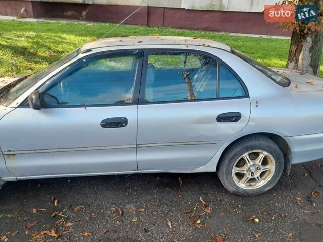 Серый Мицубиси Галант, объемом двигателя 1.76 л и пробегом 313 тыс. км за 1200 $, фото 5 на Automoto.ua