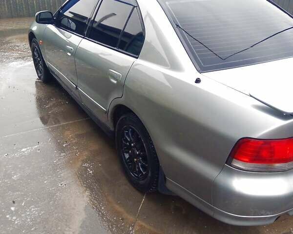 Серый Мицубиси Галант, объемом двигателя 2.5 л и пробегом 313 тыс. км за 3500 $, фото 9 на Automoto.ua