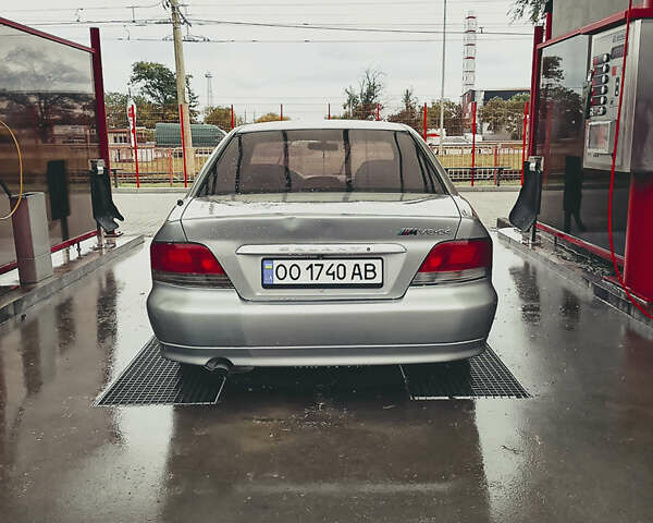 Серый Мицубиси Галант, объемом двигателя 2.5 л и пробегом 400 тыс. км за 3200 $, фото 1 на Automoto.ua