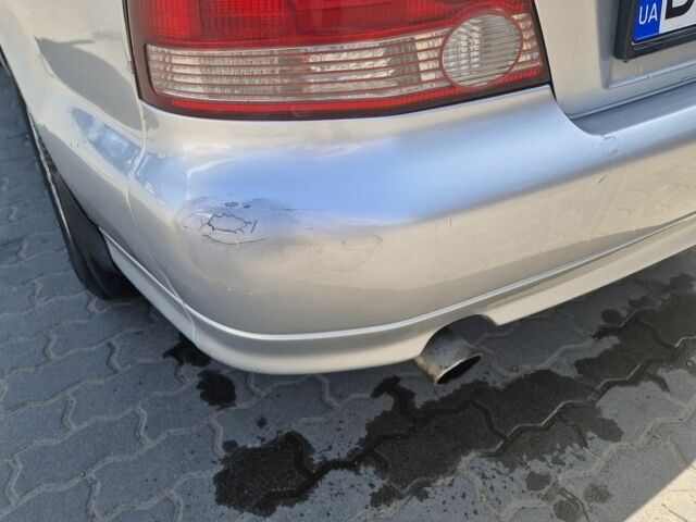 Серый Мицубиси Галант, объемом двигателя 2.5 л и пробегом 300 тыс. км за 3500 $, фото 9 на Automoto.ua