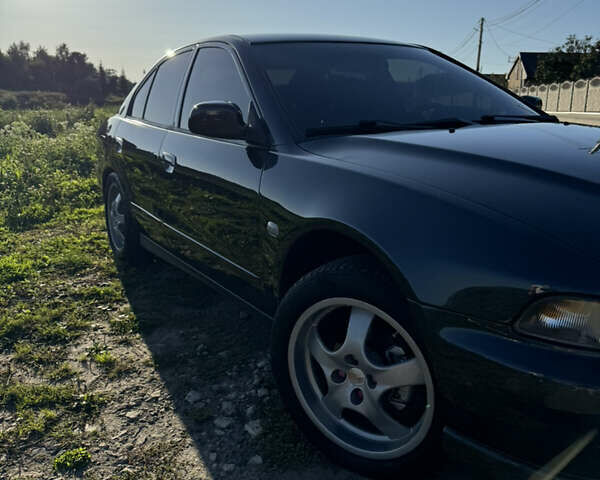 Серый Мицубиси Галант, объемом двигателя 2 л и пробегом 380 тыс. км за 5400 $, фото 13 на Automoto.ua