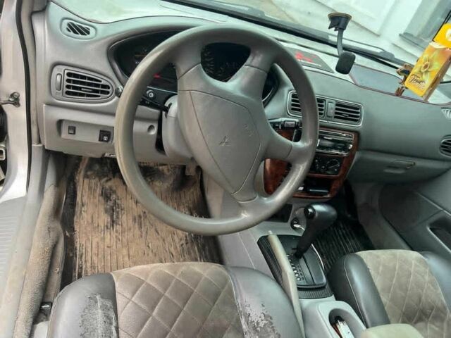 Сірий Міцубісі Галант, об'ємом двигуна 2.4 л та пробігом 400 тис. км за 2500 $, фото 7 на Automoto.ua