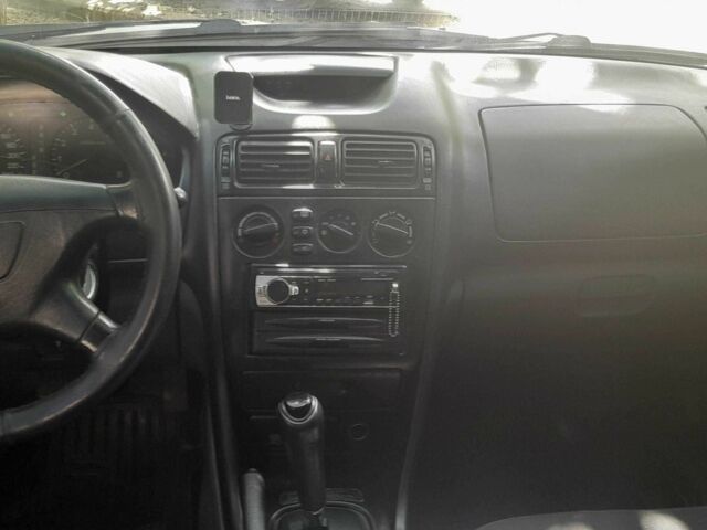 Серый Мицубиси Галант, объемом двигателя 2 л и пробегом 390 тыс. км за 2500 $, фото 4 на Automoto.ua