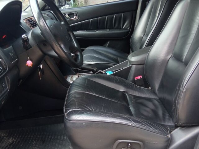 Сірий Міцубісі Галант, об'ємом двигуна 2 л та пробігом 350 тис. км за 3200 $, фото 1 на Automoto.ua