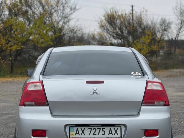 Сірий Міцубісі Галант, об'ємом двигуна 2.4 л та пробігом 220 тис. км за 2999 $, фото 4 на Automoto.ua