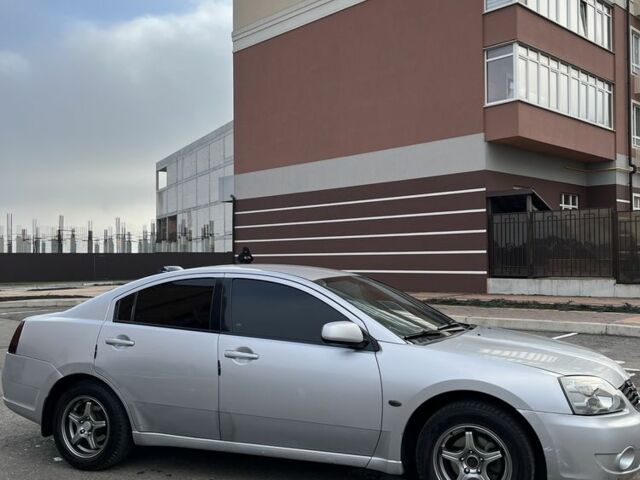 Сірий Міцубісі Галант, об'ємом двигуна 2.4 л та пробігом 270 тис. км за 2500 $, фото 1 на Automoto.ua