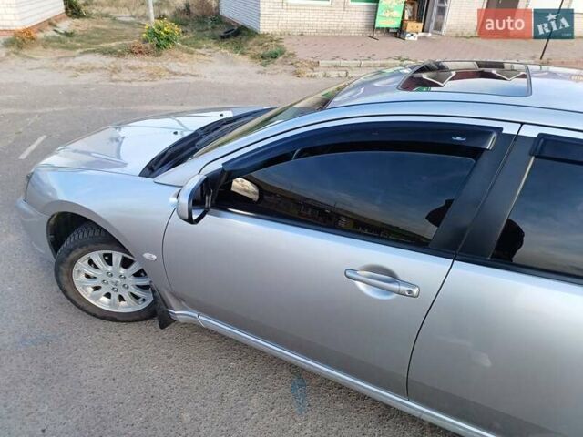 Серый Мицубиси Галант, объемом двигателя 2.4 л и пробегом 297 тыс. км за 6000 $, фото 3 на Automoto.ua