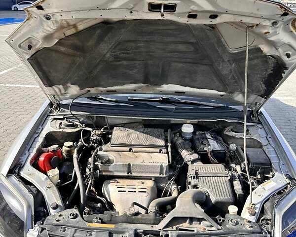 Сірий Міцубісі Галант, об'ємом двигуна 2.38 л та пробігом 221 тис. км за 5990 $, фото 42 на Automoto.ua