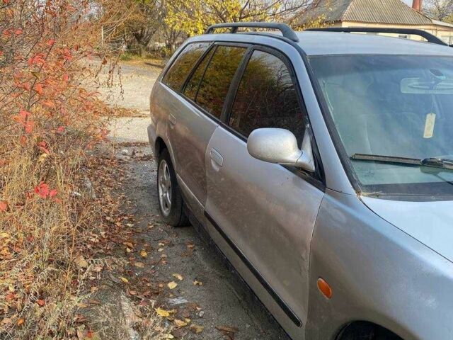 Серый Мицубиси Галант, объемом двигателя 2 л и пробегом 300 тыс. км за 600 $, фото 1 на Automoto.ua