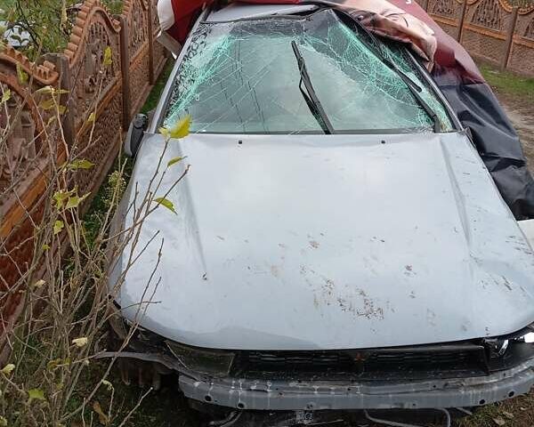 Серый Мицубиси Галант, объемом двигателя 2.5 л и пробегом 400 тыс. км за 500 $, фото 2 на Automoto.ua