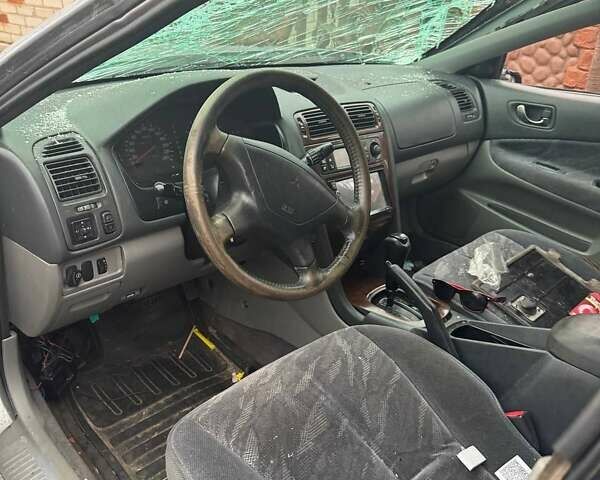 Сірий Міцубісі Галант, об'ємом двигуна 2.5 л та пробігом 400 тис. км за 1000 $, фото 1 на Automoto.ua