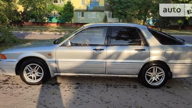 Серый Мицубиси Галант, объемом двигателя 2 л и пробегом 356 тыс. км за 2000 $, фото 1 на Automoto.ua