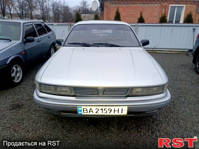 Серый Мицубиси Галант, объемом двигателя 2 л и пробегом 300 тыс. км за 2100 $, фото 1 на Automoto.ua