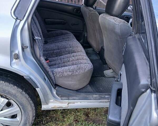 Серый Мицубиси Галант, объемом двигателя 2 л и пробегом 300 тыс. км за 1500 $, фото 3 на Automoto.ua