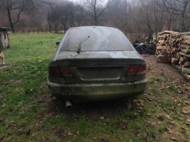 Сірий Міцубісі Галант, об'ємом двигуна 2 л та пробігом 350 тис. км за 350 $, фото 2 на Automoto.ua