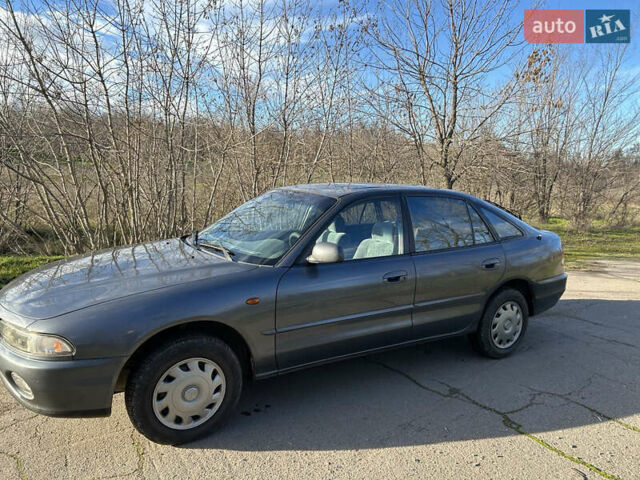 Серый Мицубиси Галант, объемом двигателя 2 л и пробегом 296 тыс. км за 2100 $, фото 1 на Automoto.ua