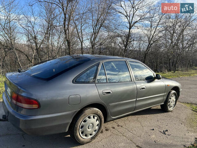 Серый Мицубиси Галант, объемом двигателя 2 л и пробегом 296 тыс. км за 2100 $, фото 2 на Automoto.ua