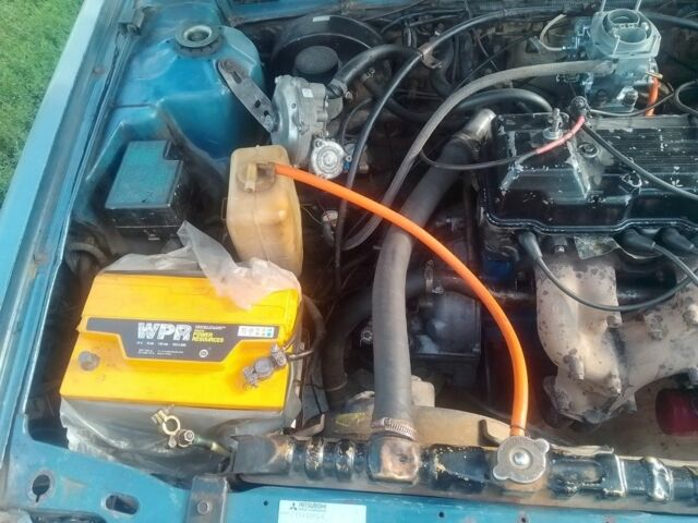 Синий Мицубиси Галант, объемом двигателя 1.8 л и пробегом 550 тыс. км за 600 $, фото 2 на Automoto.ua