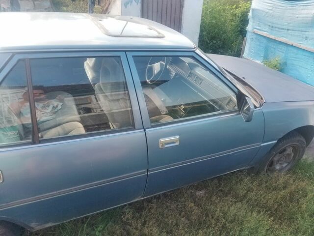 Синий Мицубиси Галант, объемом двигателя 1.8 л и пробегом 550 тыс. км за 600 $, фото 1 на Automoto.ua