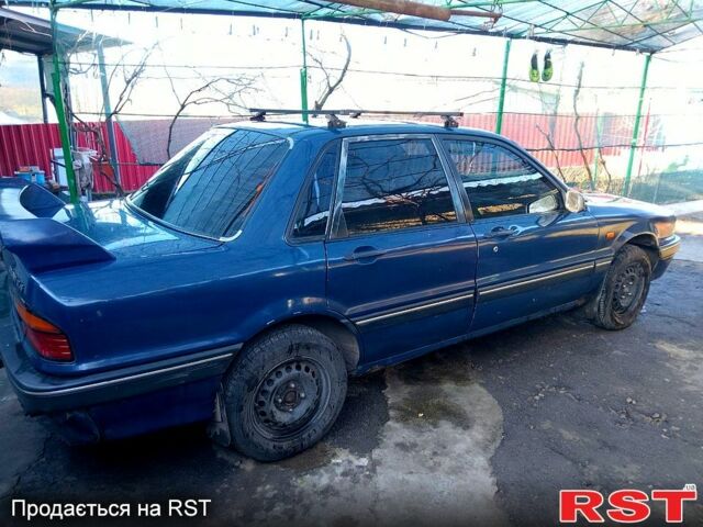 Синий Мицубиси Галант, объемом двигателя 1.8 л и пробегом 128 тыс. км за 1300 $, фото 2 на Automoto.ua