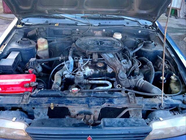 Синий Мицубиси Галант, объемом двигателя 1.8 л и пробегом 128 тыс. км за 1300 $, фото 4 на Automoto.ua