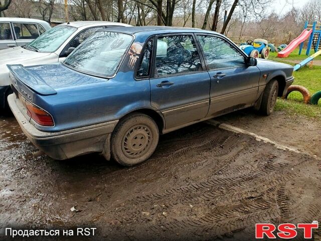 Синий Мицубиси Галант, объемом двигателя 1.8 л и пробегом 220 тыс. км за 1350 $, фото 3 на Automoto.ua